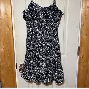 This is a Pamela X NA-KD ditsy floral black and white milkmaid summer dress